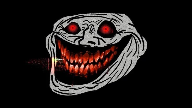 A looping gif of the troll face's grin