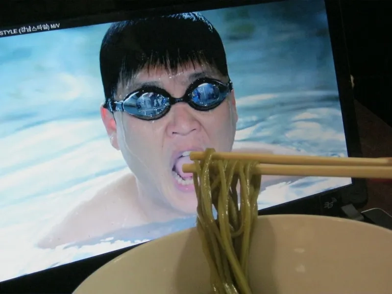 A relatable eating noodles meme